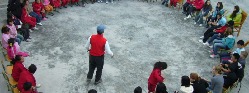 Students interacting with orphans